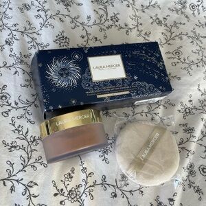 Laura mercier translucent medium deep powder and puff 

The guiding star